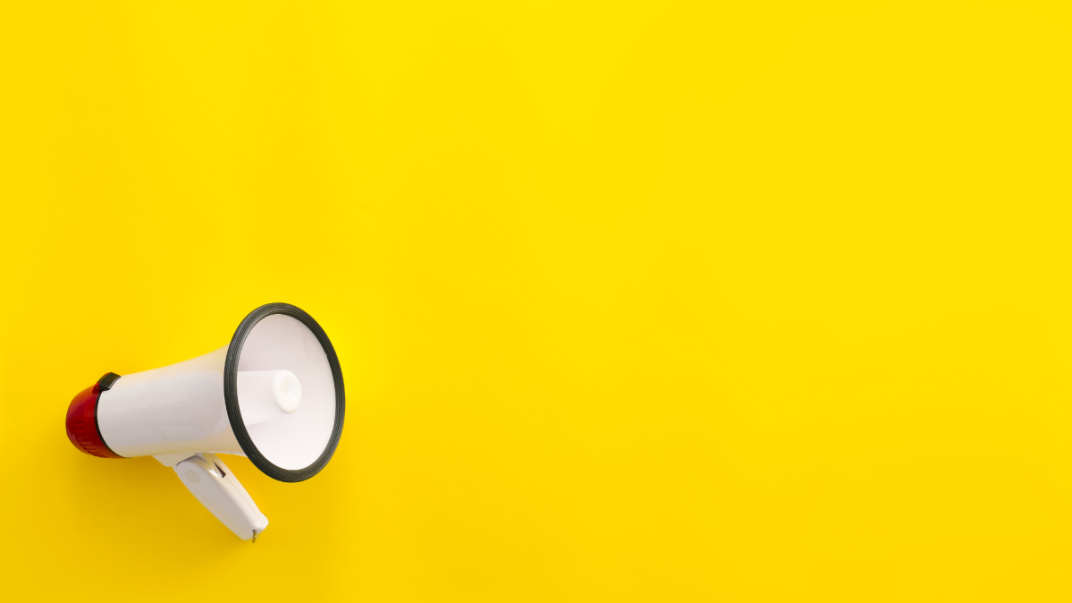 megaphone on yellow background