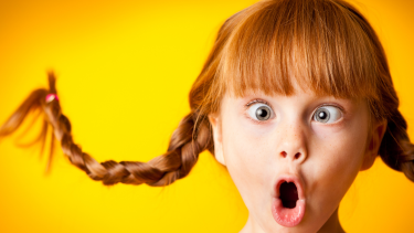 girl with crazy hair and cross eyed