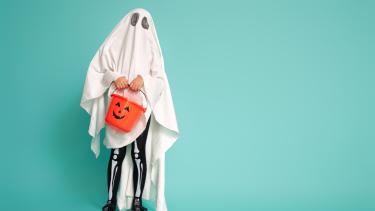 child wear ghost costume