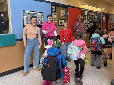 Aberdeen staff welcoming students to school