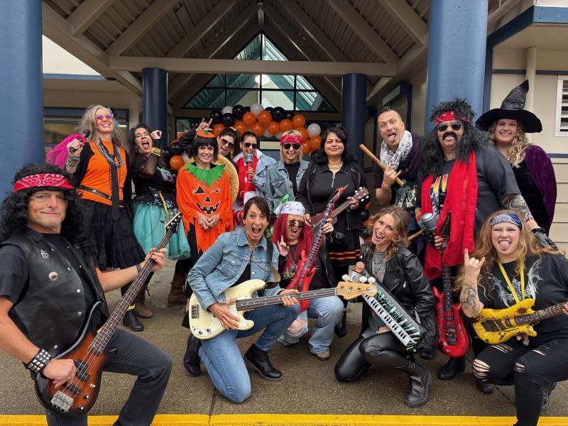 staff in Halloween costumes